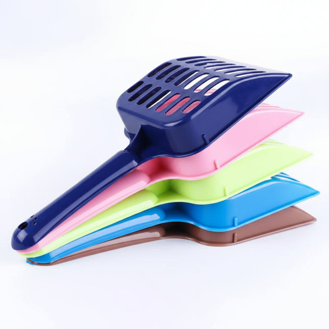 Set of colorful cat litter scoops on a white background