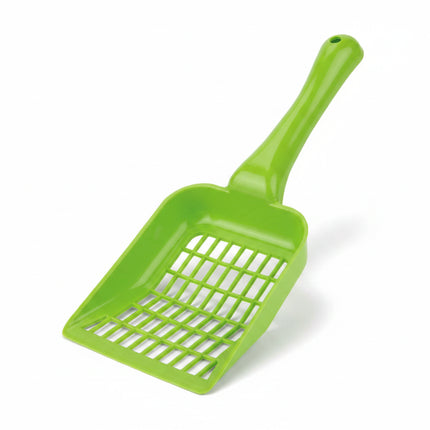 Green plastic pet scoop on a white background